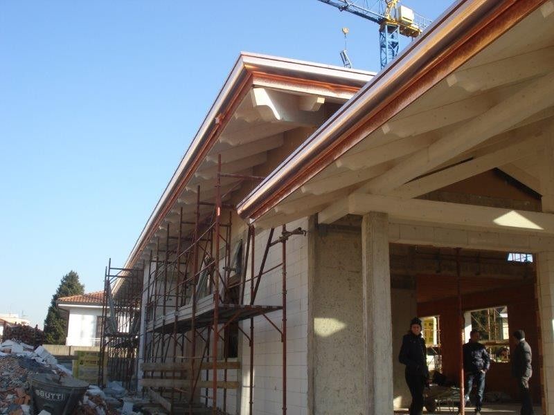 Sopraelevazioni in legno BCL Tetto a Origgio legno lamellare certificato FSC e PEFC sbiancato con finitura Ammon