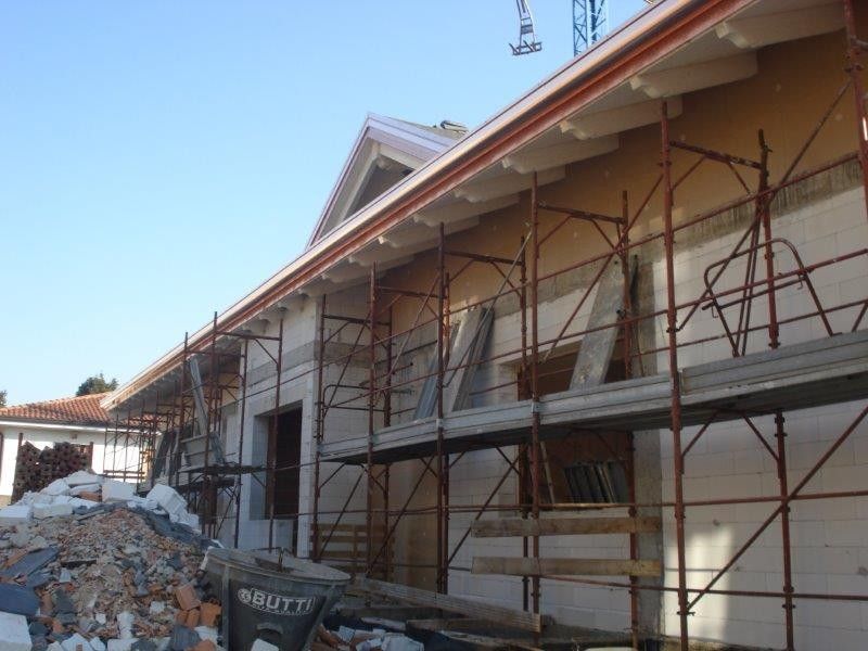 Sopraelevazioni in legno BCL Tetto a Origgio legno lamellare certificato FSC e PEFC sbiancato con finitura Ammon